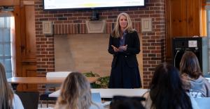 Instructor speaks to classroom of PsyD students