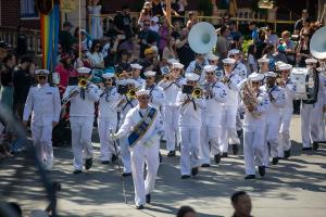Navy Band Southwest marches in formation during a performance at Disneyland during LA Fleet Week 2024