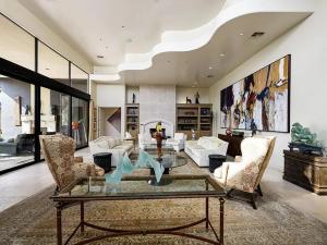 A photo of a beautifully curated interior living area featuring many beautiful works of art.