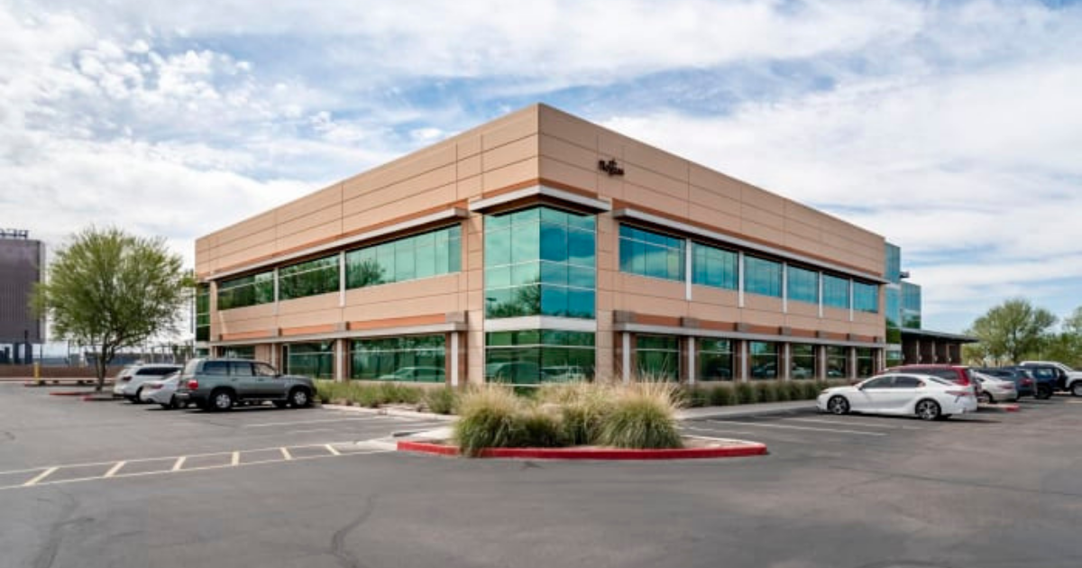 Exterior view of The Valley Law Group’s Peoria law office with professional signage and desert landscaping.