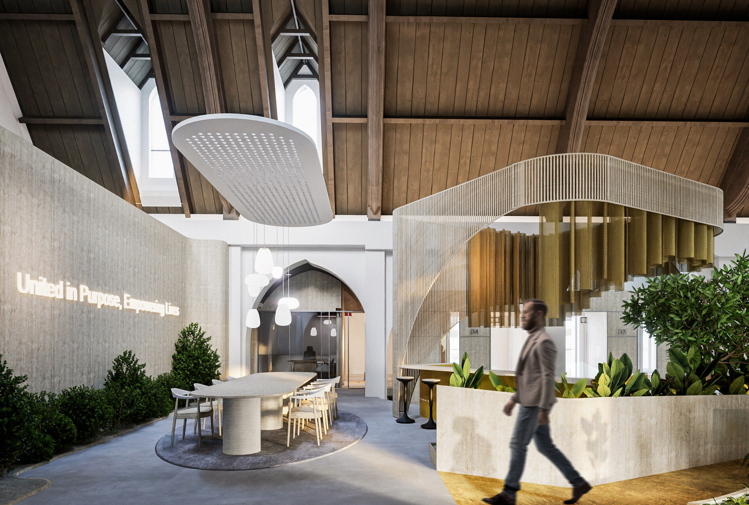 Community table area behind the central bar, with chairs arranged for group interaction, reflecting the values of inclusion and togetherness.