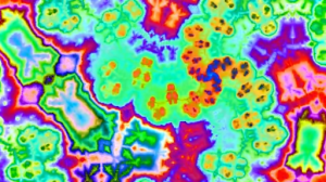 Still image from Hyperflux visual instrument showing colorful, structured patterns animated by fractal feedback and wave interference.