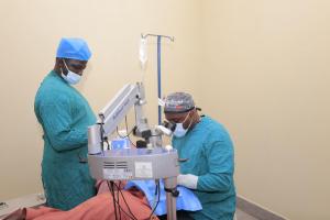 surgeon working on patient in school classroom