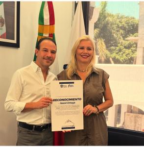 In recognition of her impactful work, Hazel received an official acknowledgment from Mayor Juan Manuel de Unánue, highlighting her contributions to the community and her role in promoting empowerment and second chances.