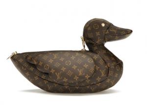 The Jewelers Coin & Loan Co. presents a Memorial Day Live Show featuring authentic designer handbags, wallets, jewelry, gold chains, diamonds, scarves, and sunglasses. The collection includes items from Chanel, Prada, Gucci, Hermes, Louis Vuitton, YSL, Go
