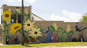 Secured through the St. Johns Cultural Council’s Art in Public Spaces grant program the artwork celebrates the area’s rich farming heritage with vibrant imagery of local crops, native wildlife, and an interactive vegetable cart pulled by a real bicycle.
