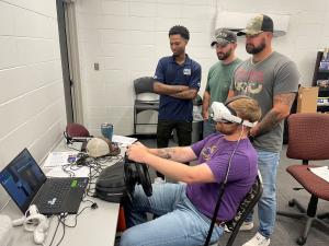 Veterans training on BluWorkz' virtual forklift