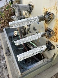 Crews replaced this pad-mount transformer’s corroded secondary bars with new submersible secondary bars and correctly labeled all equipment.