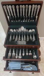 Tiffany & Co. 111-piece sterling flatware dinner and luncheon service in the “English King” pattern, housed in a vintage, 3-tier Reed and Barton silverware chest. Estimate: $13,000-$16,000