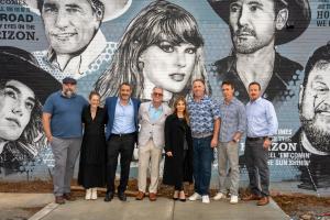 Horizon Nashville development team and Airbnb team pose for a group photo during a property tour.