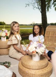 holistic educational enrichment, family-centered learning, immersive STEM experiences, Formula 1 inspired education, floral design enrichment, sound therapy for youth, equestrian learning, farm-to-table education, cultural enrichment for families, A Noble