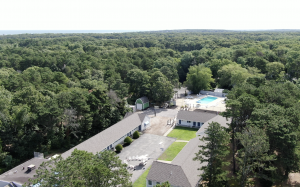 Aerial view showing buildings, pool and landscape at The Recovery Team - Cape Cod
