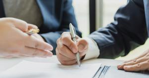 Attorneys reviewing arbitration agreement from nursing home.