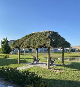 Native American Palm Tiki Huts of FL re-thatches