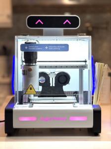 The Sugar Printer™ transforms molten sugar into custom lollipops—logos, animals, and even edible selfies—made live in under two minutes.
