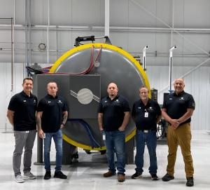VAC AERO US Team at the Greenville Plant in front of a vacuum furnace