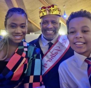 The Jennings Family pose for a photo after Dad wins Father of the Year!