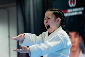 Madison Knight, a 12-year-old black belt, performs a powerful kata during competition at the 2025 AKA World Cup in Chicago, showcasing intense focus and precision.