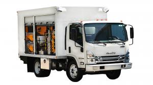 Right-front angle of Real Fleet Solutions’ Tree Spraying Truck with side compartment open, showcasing secure equipment storage and professional-grade build.
