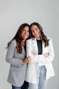 Mother and daughter leadership team at CoreLife Wellness smiling together in professional attire – experts in pelvic health and core rehabilitation in Oakville, Ontario.