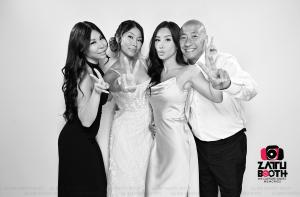 GROUP OF PEOPLE POSING AT A WEDDING