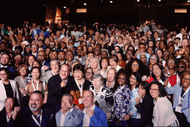 Experior Events triumphs - large crowd celebrating and cheering