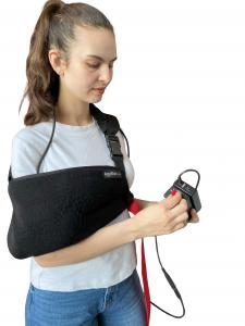 nurse with the tremor simulator that lets her experience tremo in old people