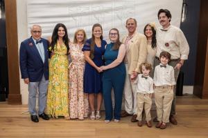 A group of board members and family of the Sophia Ruggieri Memorial Foundation are show with Kelly Wolf, (5th from left), recipient of the foundation's second college scholarship for those with Type 1 Diabetes.