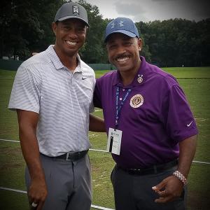 Tiger Woods (left) Charles Eggleston (right)
