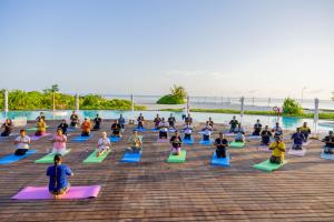 Sunrise yoga at Cinnamon Velifushi Maldives