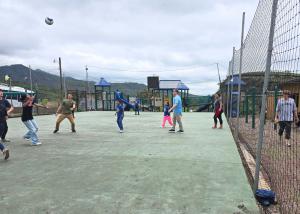 St. Charles students and Samaritan Scholars playing soccer together next to the Tegucigalpa municipal garbage dump.