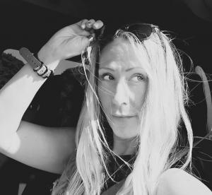 Black and white artistic portrait of Ann Marvin, expert sound healer, wellness coach, and contributing author to the international #1 bestselling anthology Whispers of the Soul: Stories of Resilience, Awakening, and the Power of Healing from Within. Captu