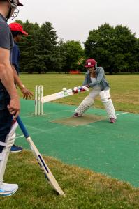 Toronto Mayor Olivia Chow batting on the cricket pitch during the CIMA Mayor’s Trophy Cricket opening ceremony.