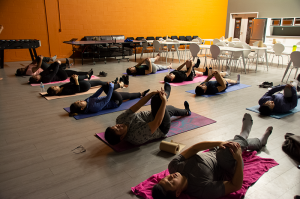 Corporate yoga class in progress