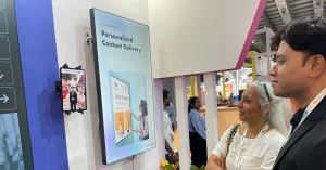 Visitors engaging with Pickcel-powered screens