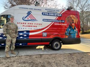 Lilburn, GA plumber Stars and Pipes Plumbing Atlanta owner Sean Nelson in front of his work van