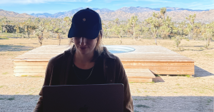 Remote work on laptop in Arizona, creating branding for an outdoor brand in Arizona