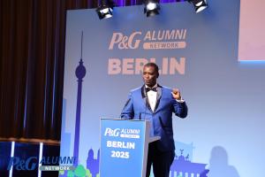 Aliyu Mohammed Ali receiving the P&G Alumni Early Achievement Award at the 2025 Global Conference in Berlin, honoring circular economy leadership.