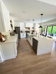 Modern Farmhouse Kitchen by Mora Interior Design