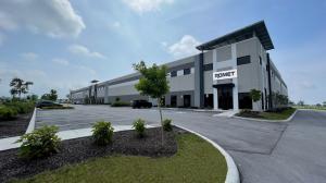 New manufacturing facility in Indianapolis with Romet sign on front of building
