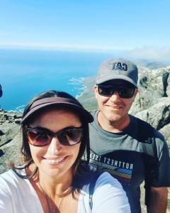 From a $13M business exit to a life by design — Peggy and Paul Crane now run their global business from anywhere, including the beach.