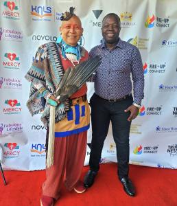 Uqualla, (left) a renowned spiritual leader and ceremonialist from the Havasupai people, led the interdenominational prayer for peace during The Grand Butterfly Gathering. With him is Raymond Ouma from Kenya, who is part of The Trueness Project. Photo: Courtesy.