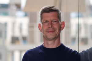 Portrait image of Stefan Drees, the Global Sales Director in IoT telecom company IXT. The image shows Mr. Drees face forward, slightly smiling.