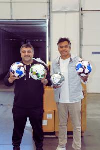 Hamayun Babar and Kellen Tallada unloading the first shipment of Tekno24 soccer balls at the Avondale, Arizona warehouse