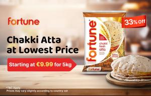 Image of Fortune Chakki Fresh Atta pack with a red ‘33% off’ ribbon, a stack of rotis on a wooden board, and banner reading ‘Starting at €9.99 for 5 kg.’