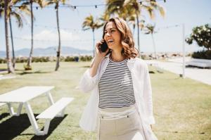 Brooke Davies smiling outdoors, representing her success as a Prosperity Of Life entrepreneur.