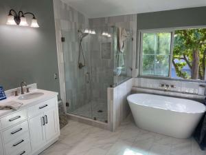 Shower and bathtub with a new vanity installation with Future Generation Construction