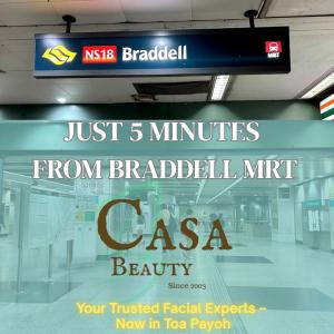 MRT sign for Braddell Station in Singapore, with Casa Beauty Toa Payoh text overlay promoting its new facial salon location just 5 minutes away.