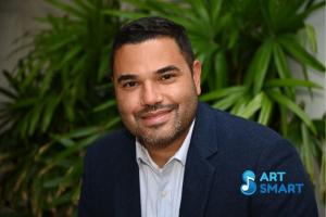 The headshot of Ahmad Mayes with an ArtSmart logo overlay.