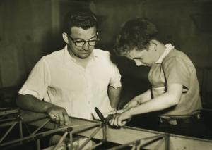 Louis C. Seno Sr. and Louis C. Seno Jr. work on their homebuilt aircraft, circa 1950s.